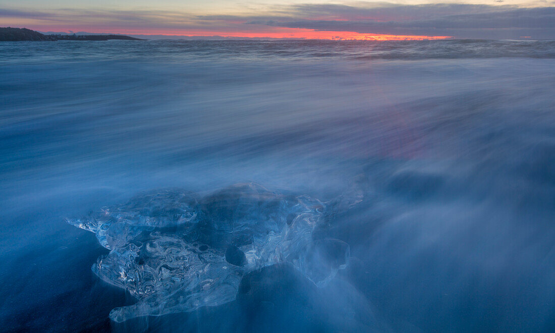 Scattered ice from icebergs on black sand beach at Joklusarlon, Iceland (Large format sizes available)