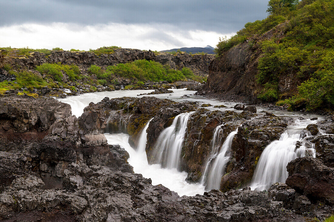 Europe, Iceland, West Iceland, Borgarfjordur, Barnafoss, Children's Falls, Hvita River. Water from these picturesque falls flow swiftly into the Hvita River.