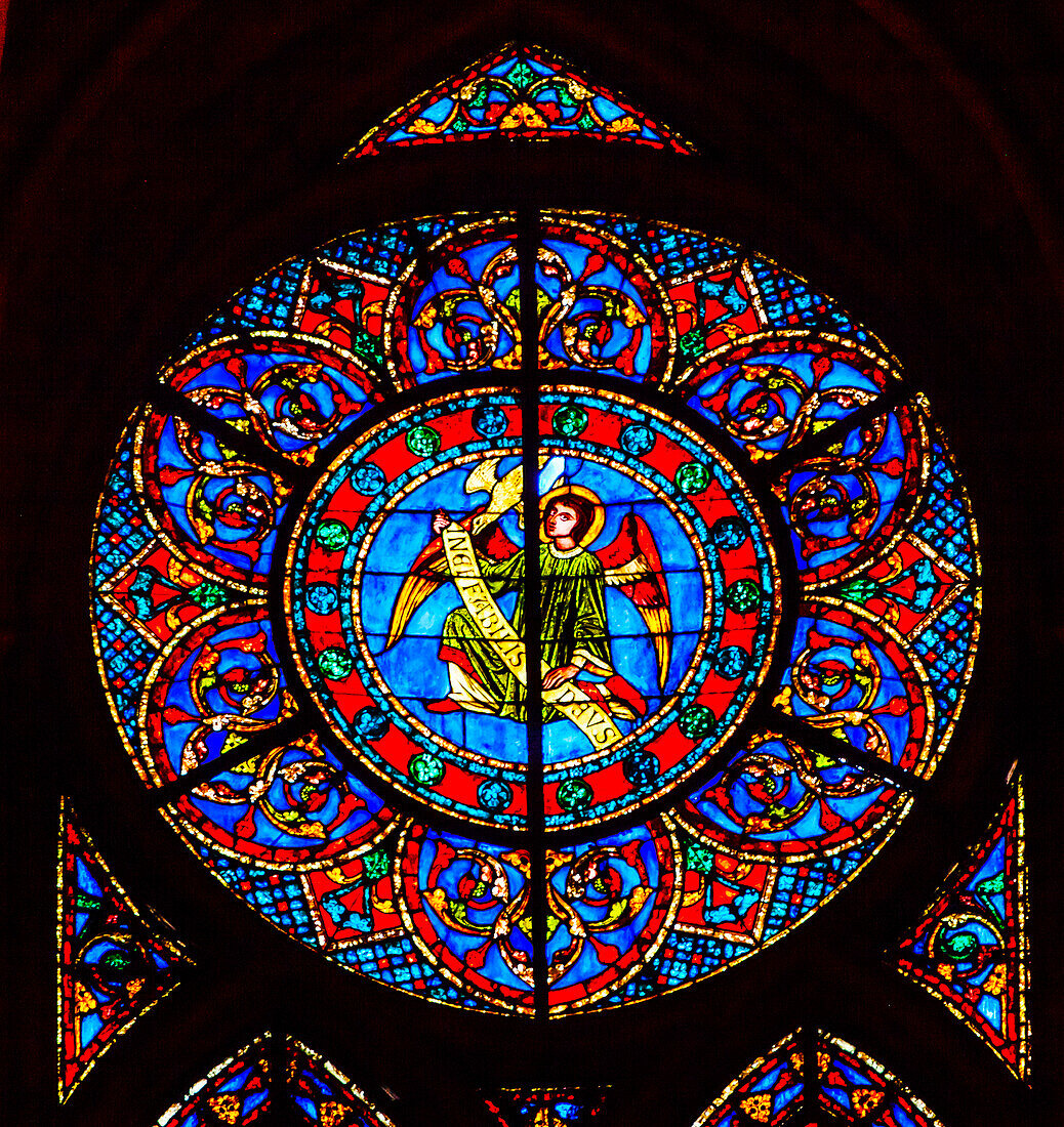 Angel stained glass, Notre Dame Cathedral, Paris, France. Notre Dame was built between 1163 and 1250 AD.