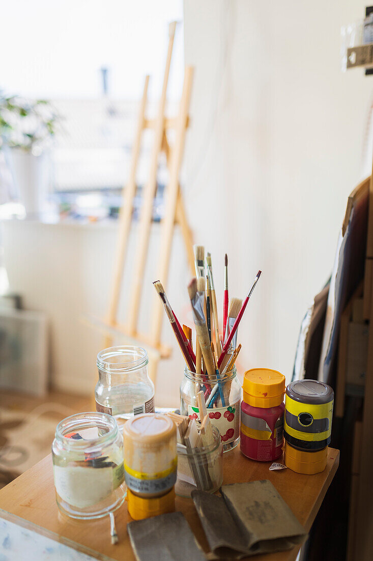 Paintbrushes in artist studio