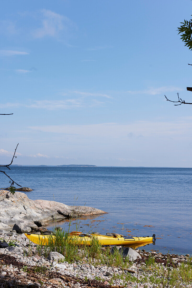 Kayak on rocky coast