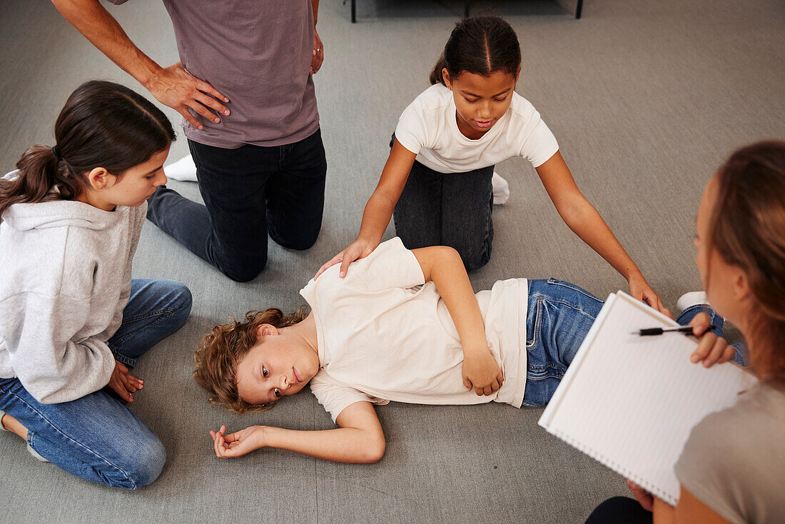 Teachers giving first aid training