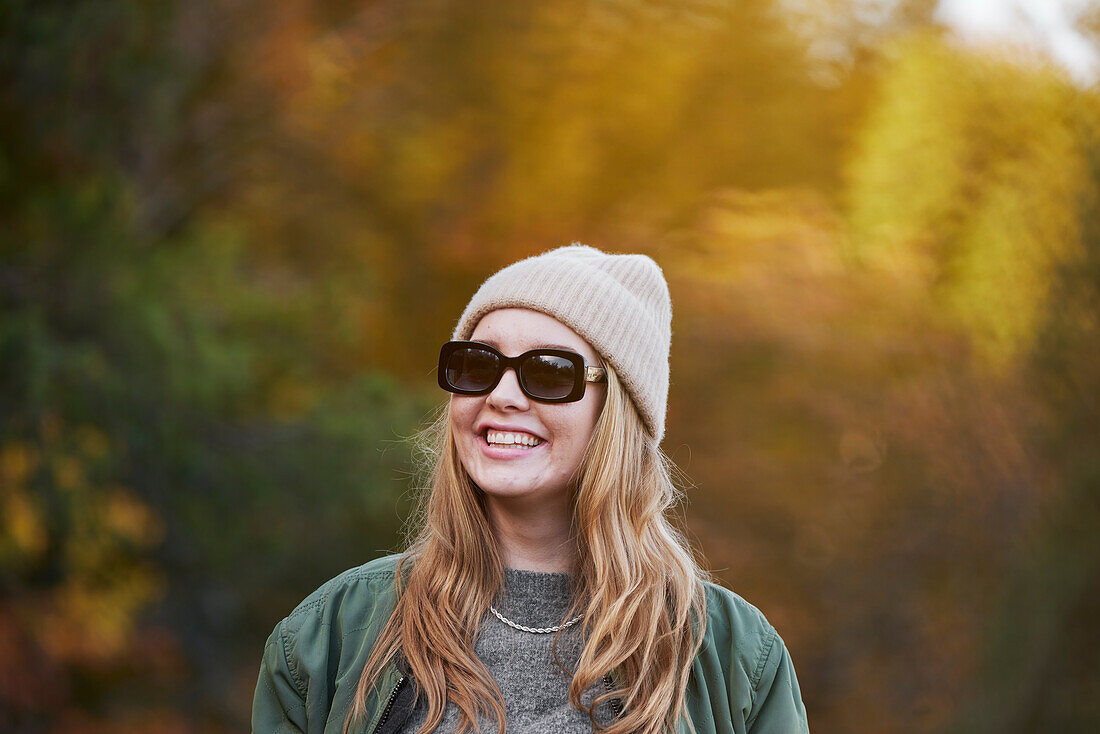 Woman wearing sunglasses looking away