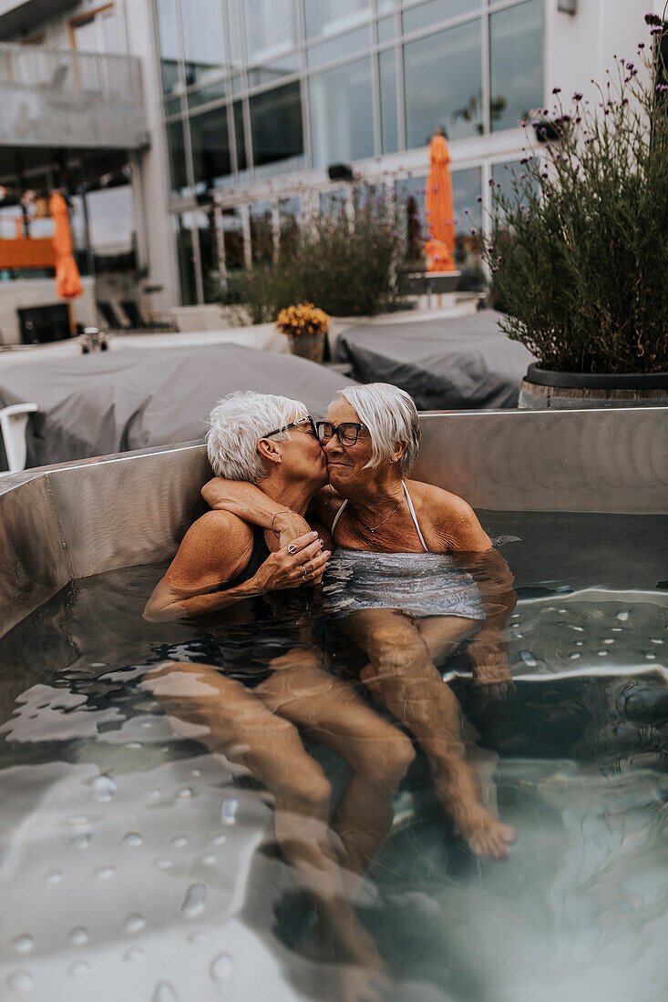 Happy women in hot tub