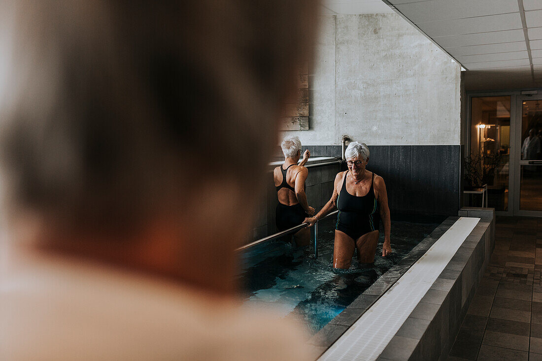 Senior woman in spa swimming-pool