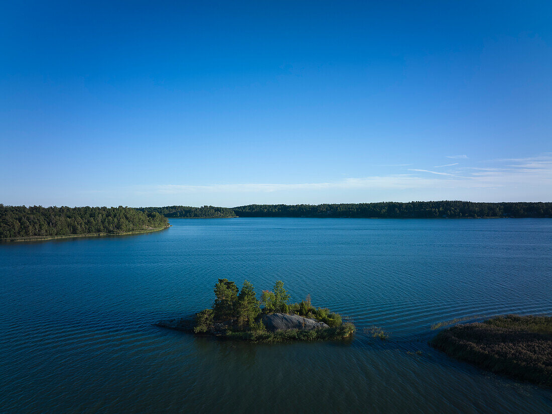 View of small island in lake