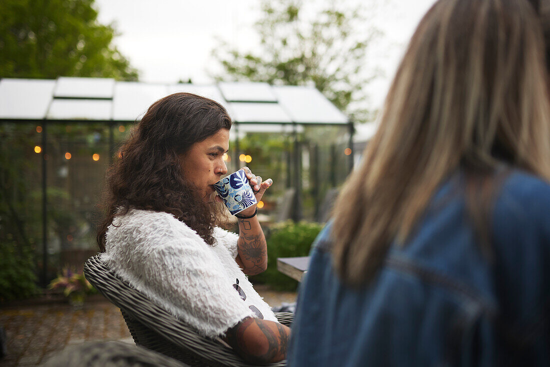 Man having drink at table