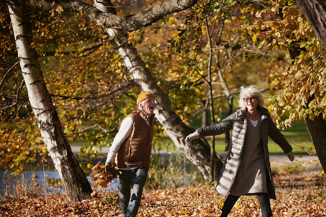 Senior couple in autumn scenery