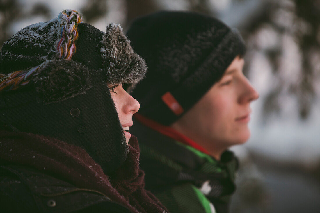 Two teenage boys in winter scenery