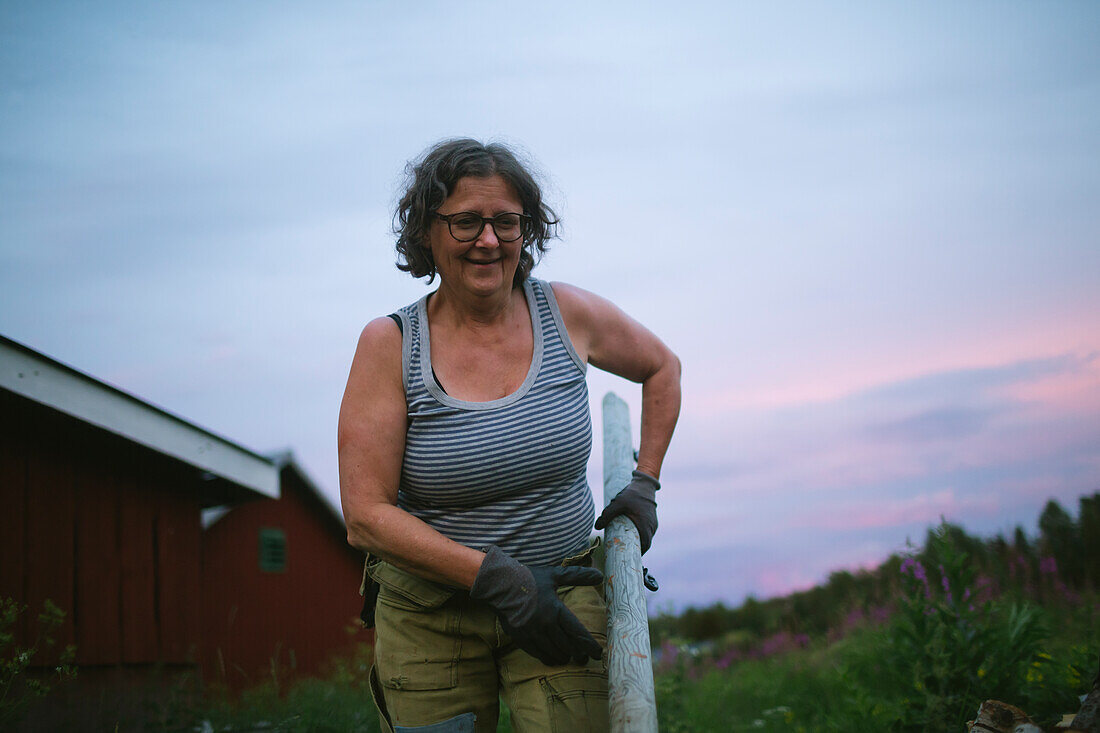 Mature woman working in garden