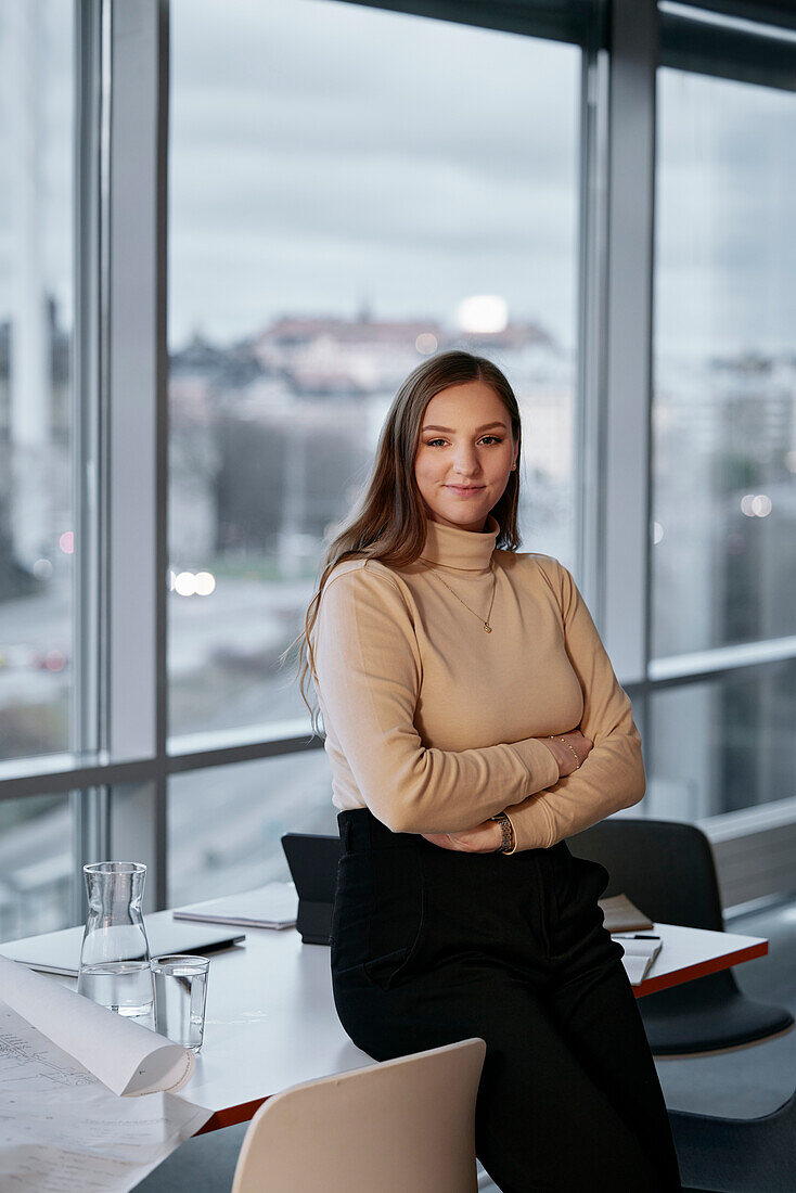 Portrait of young businesswoman in office