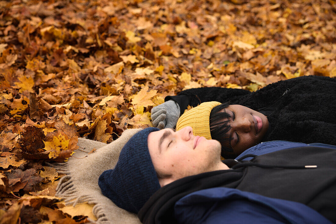 Young couple lying together