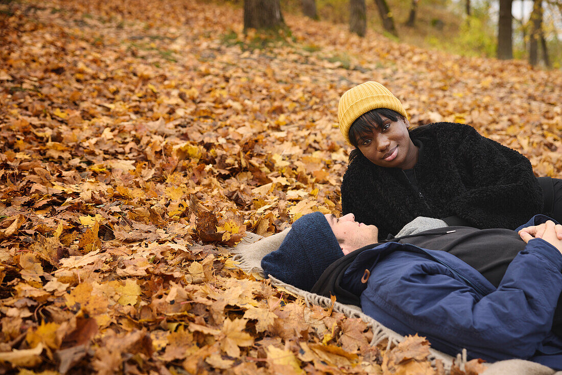 Young couple lying together