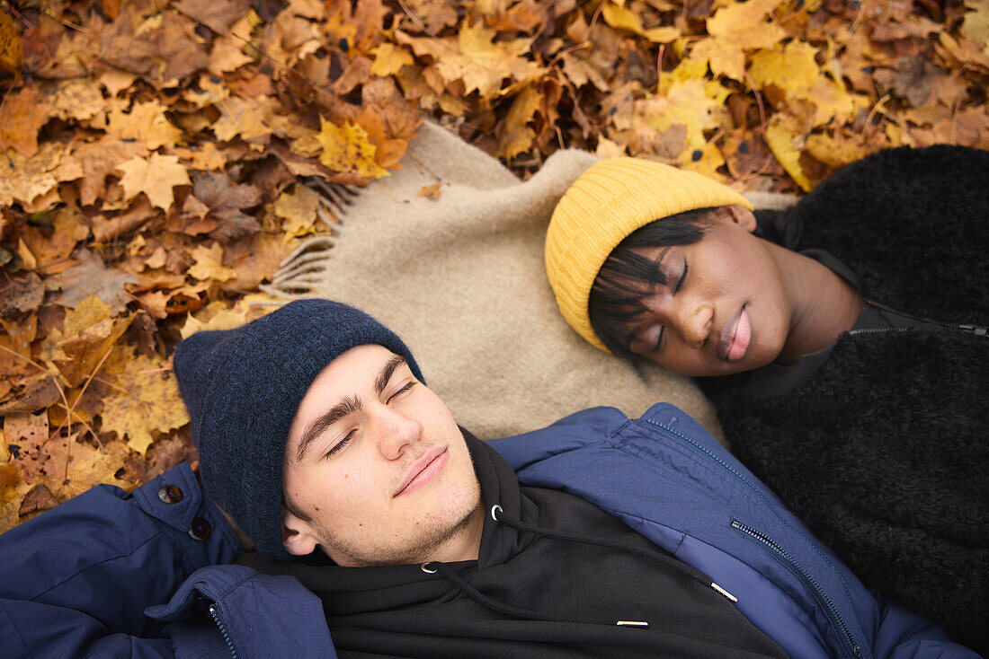 Young couple lying together