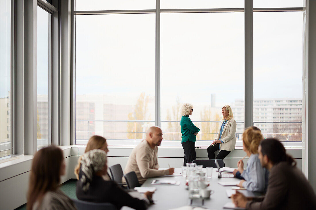 People talking during business meeting