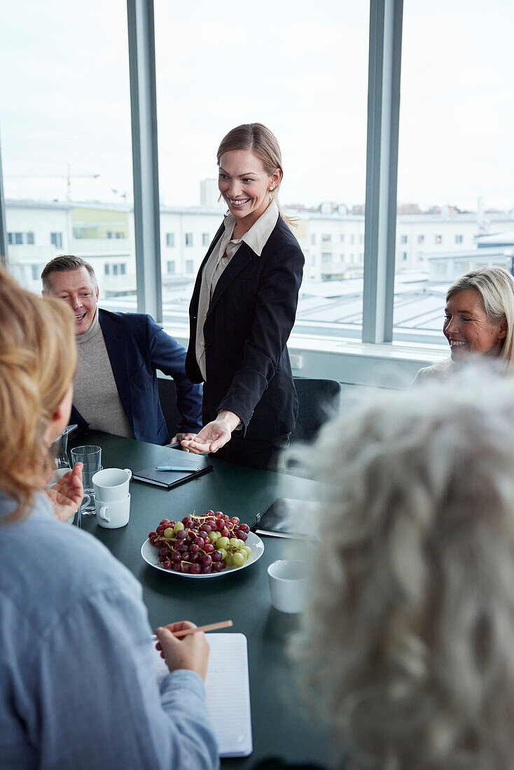 Smiling woman during business meeting