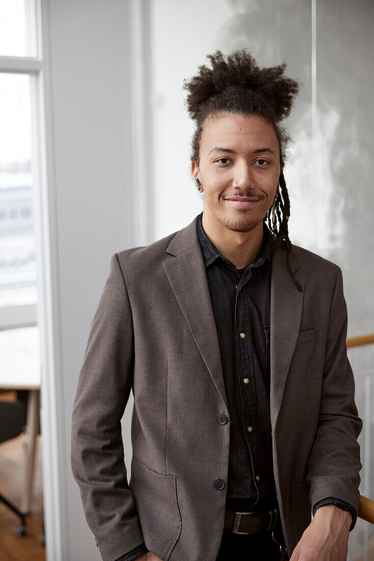 Portrait of young businessman in office