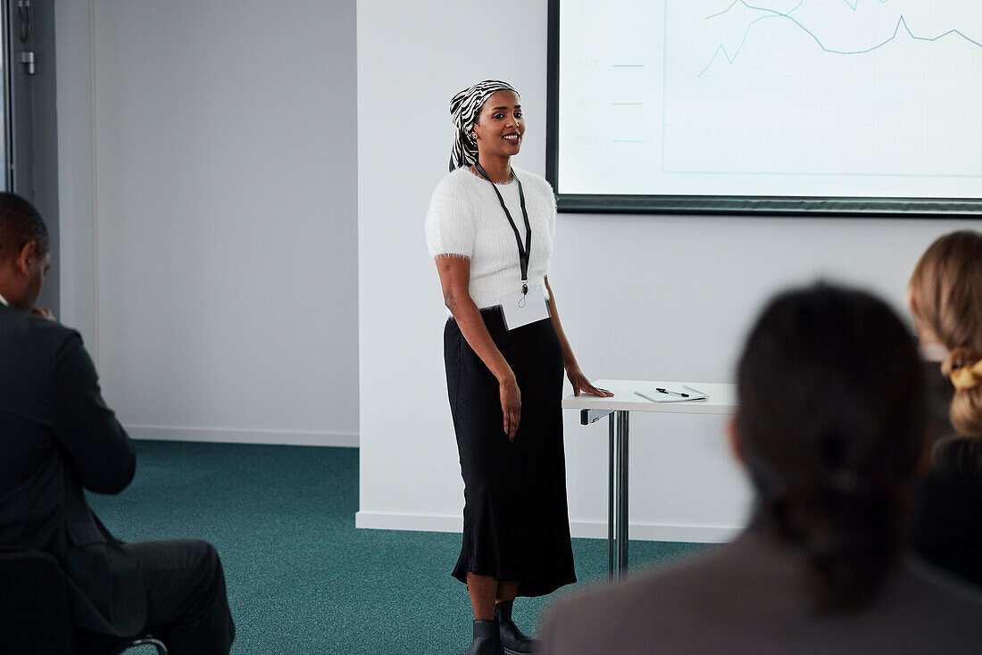 Woman having presentation during business meeting