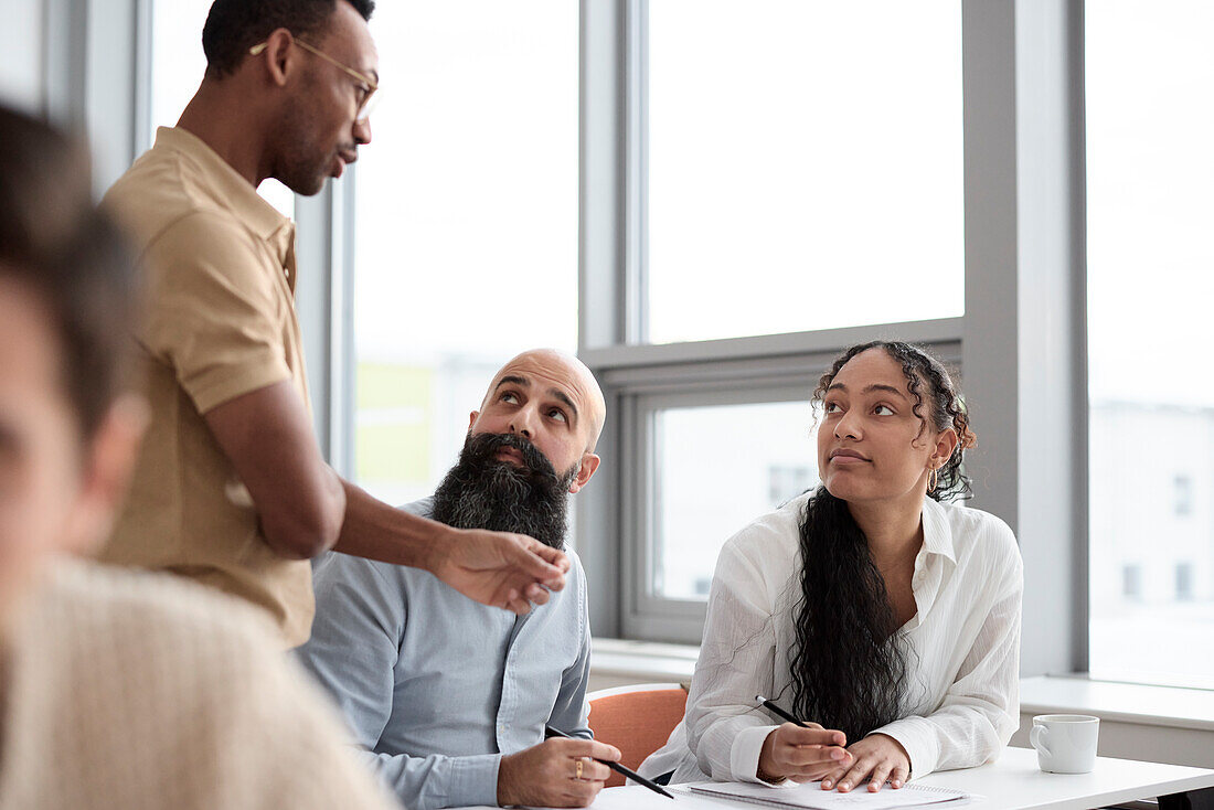 Teacher and adult students in class