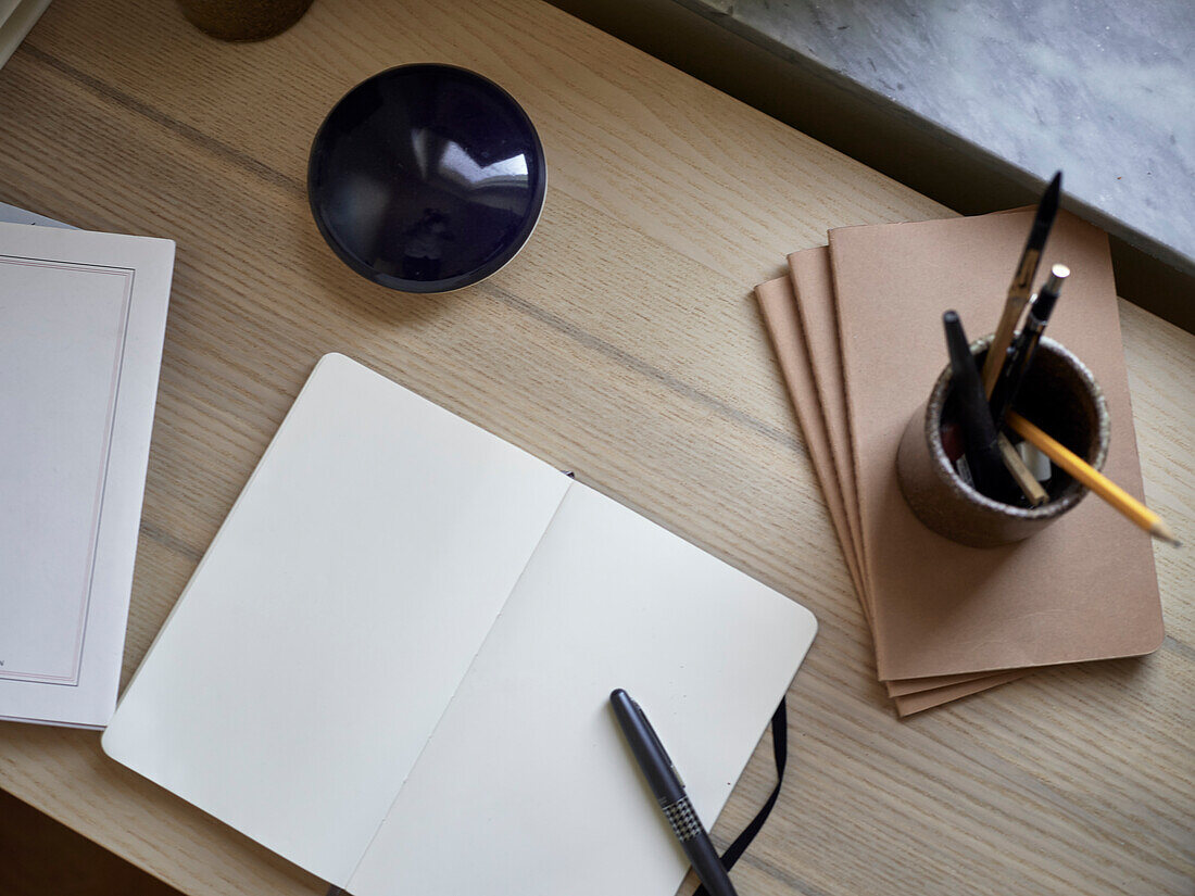 Open diary on wooden desk