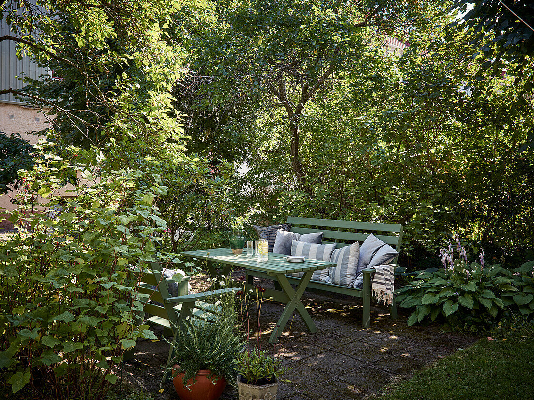 Bench and table in garden