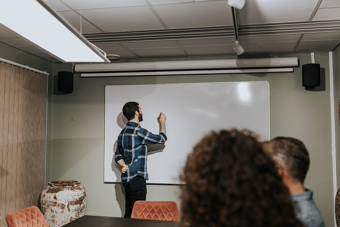 Man having presentation during business meeting