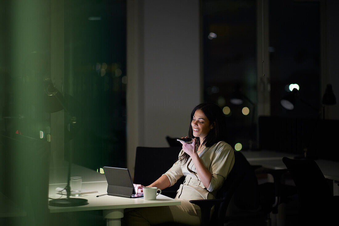 Woman working late in office