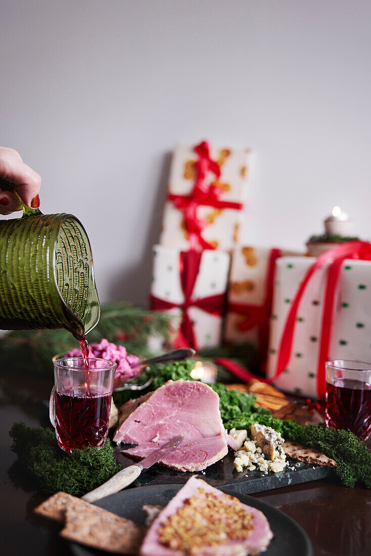 Christmas food and presents on table