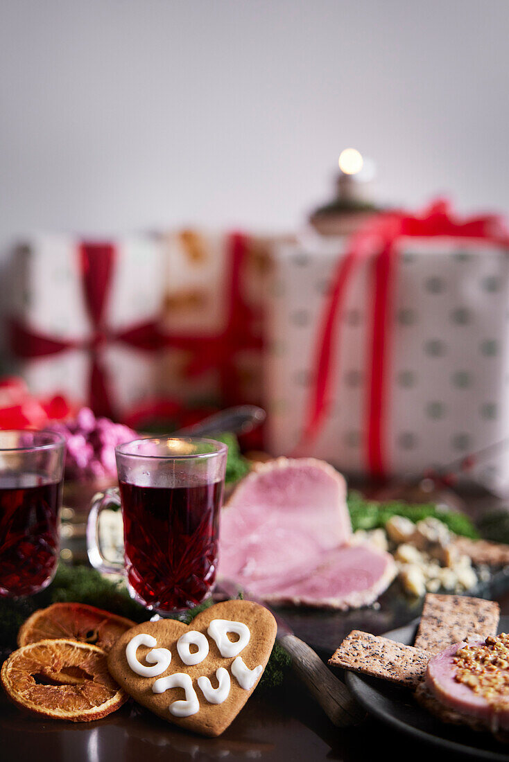 Christmas food and presents on table