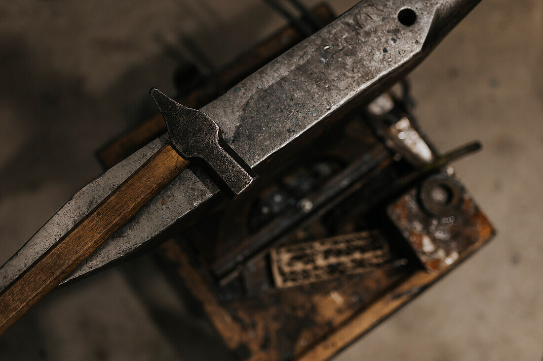 High angle view of hammer and anvil