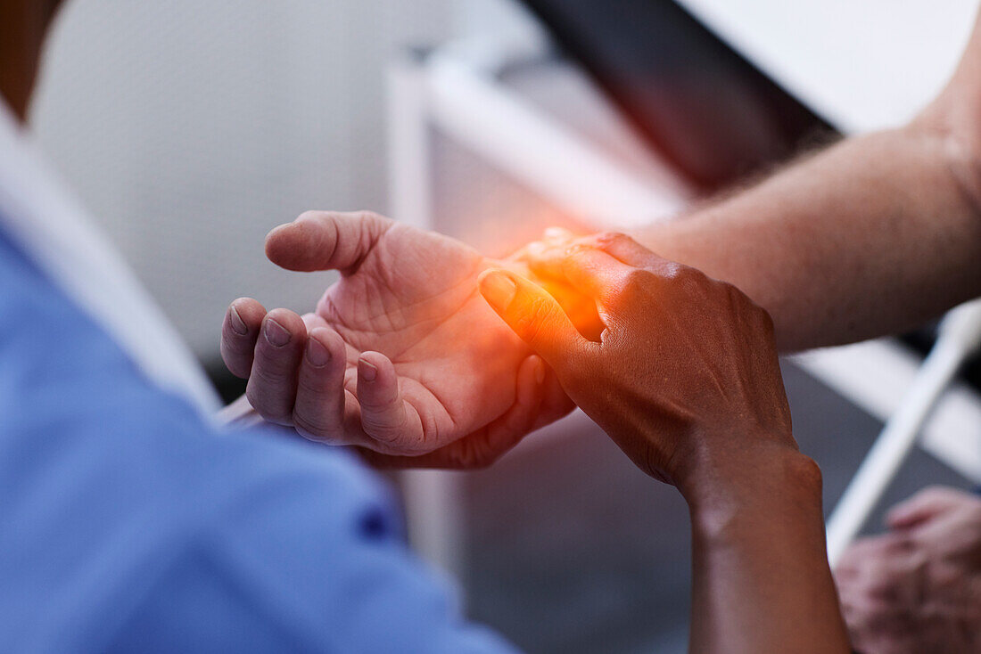 Female doctor checking patient's pulse