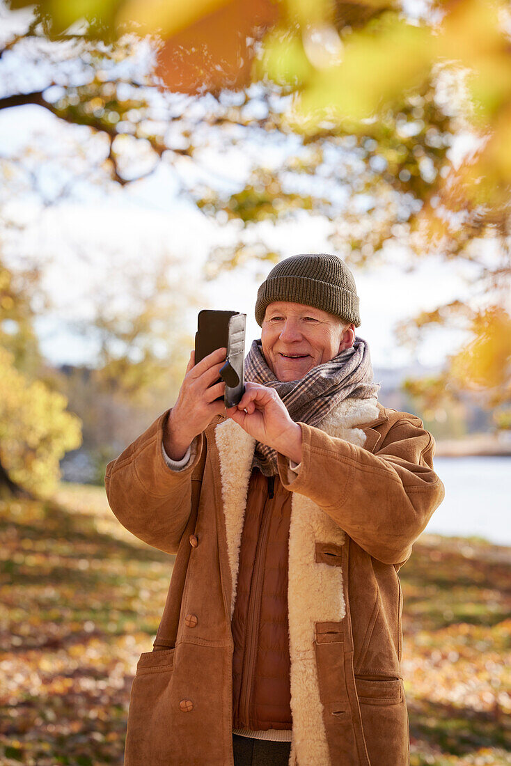 Senior man using cell phone