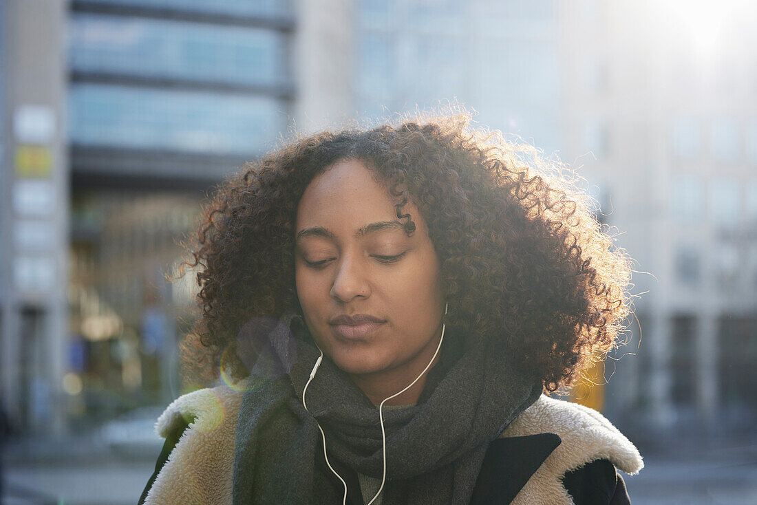 View of woman with earphones