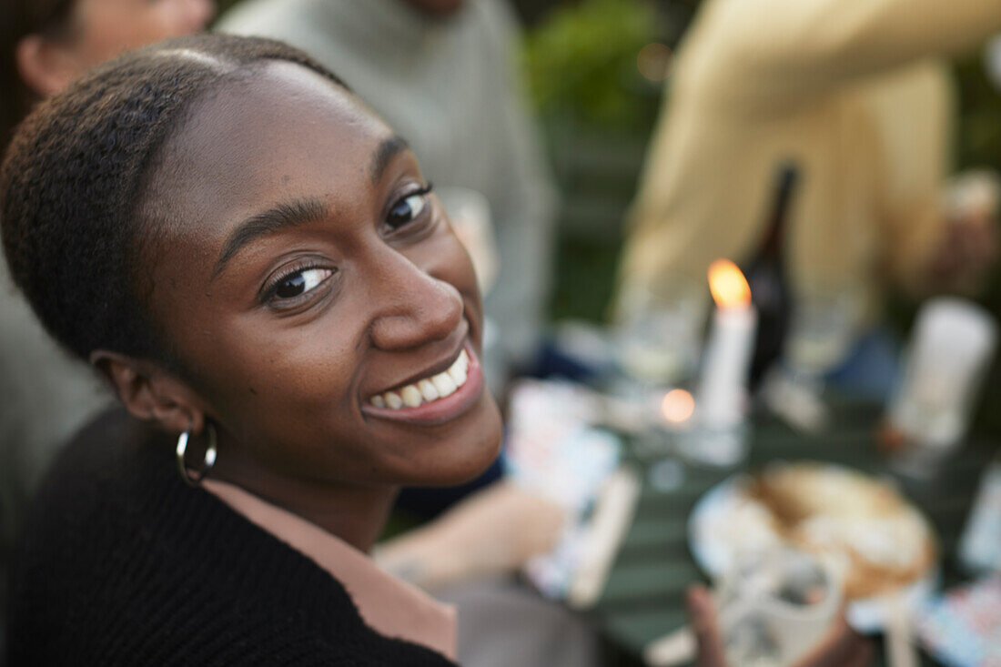 Smiling woman looking at camera during