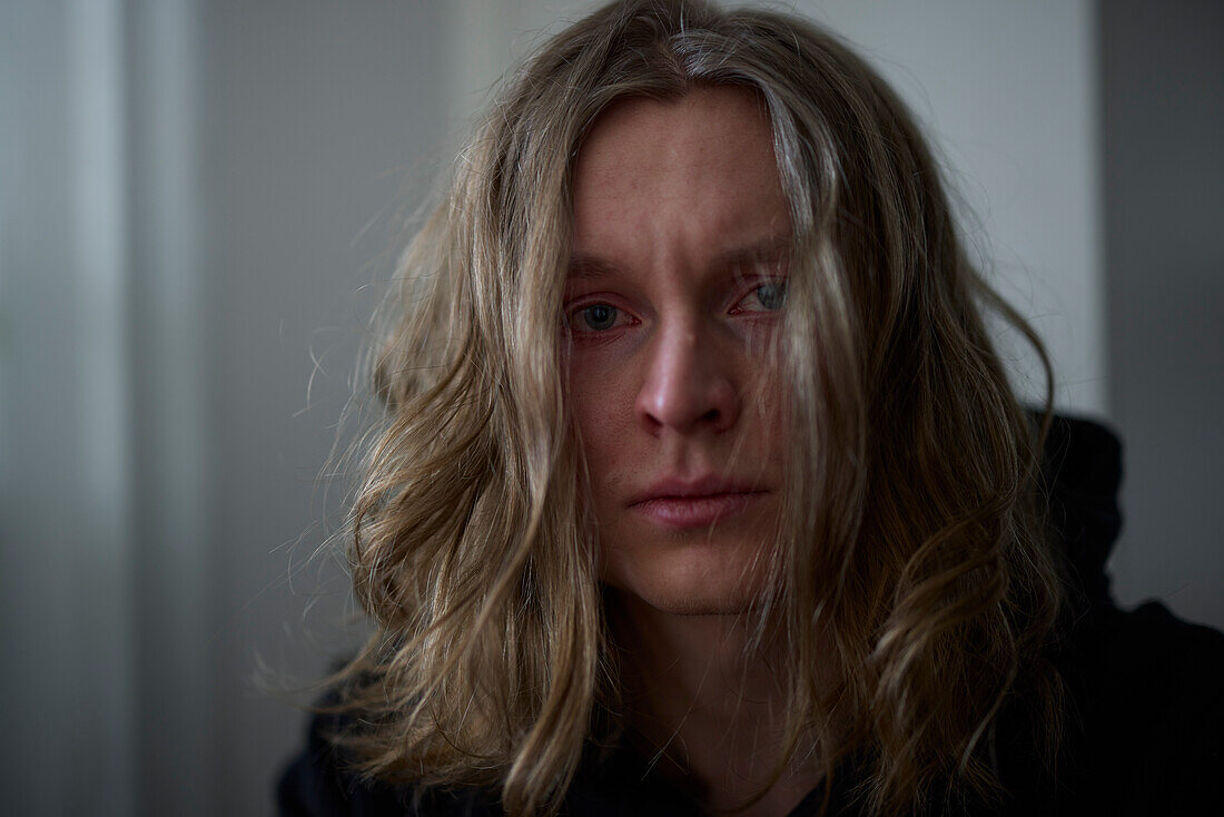 Portrait of crying woman looking at camera