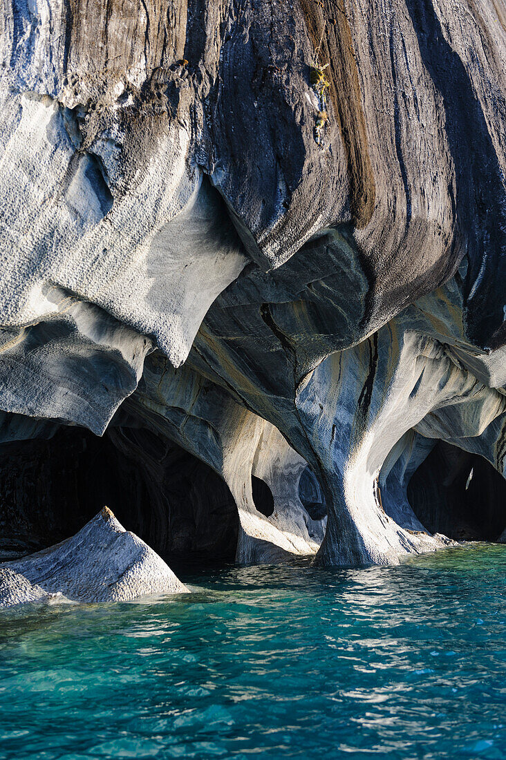 Chile, Aysen, Puerto Rio Tranquilo, Marble Chapel Natural Sanctuary. Limestone (marble) formations that has been carved and polished by the lakes wave action.
