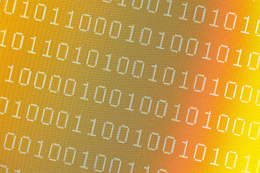 Binary numbers on pixelated yellow computer screen