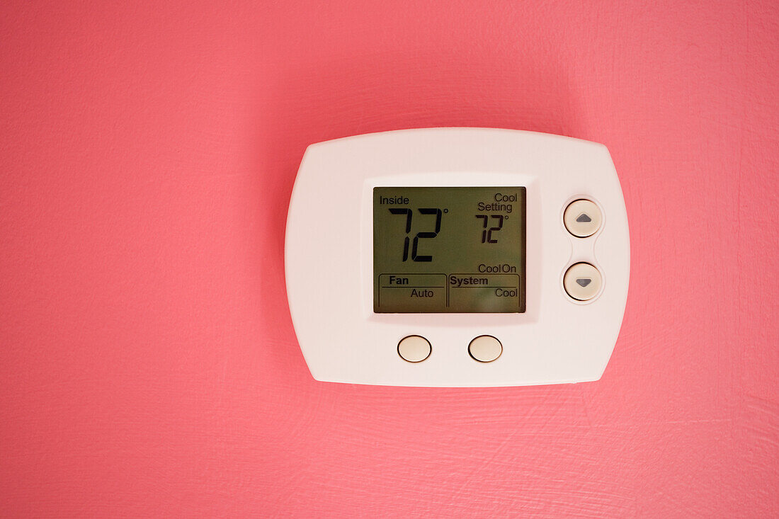 Wall thermostat at 72 degrees Fahrenheit