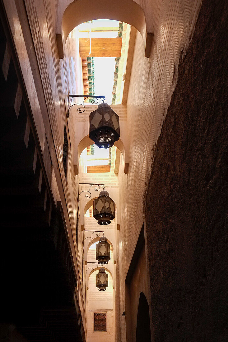 Africa, Morocco, Low angle view of metal streetlamps in alley in medina