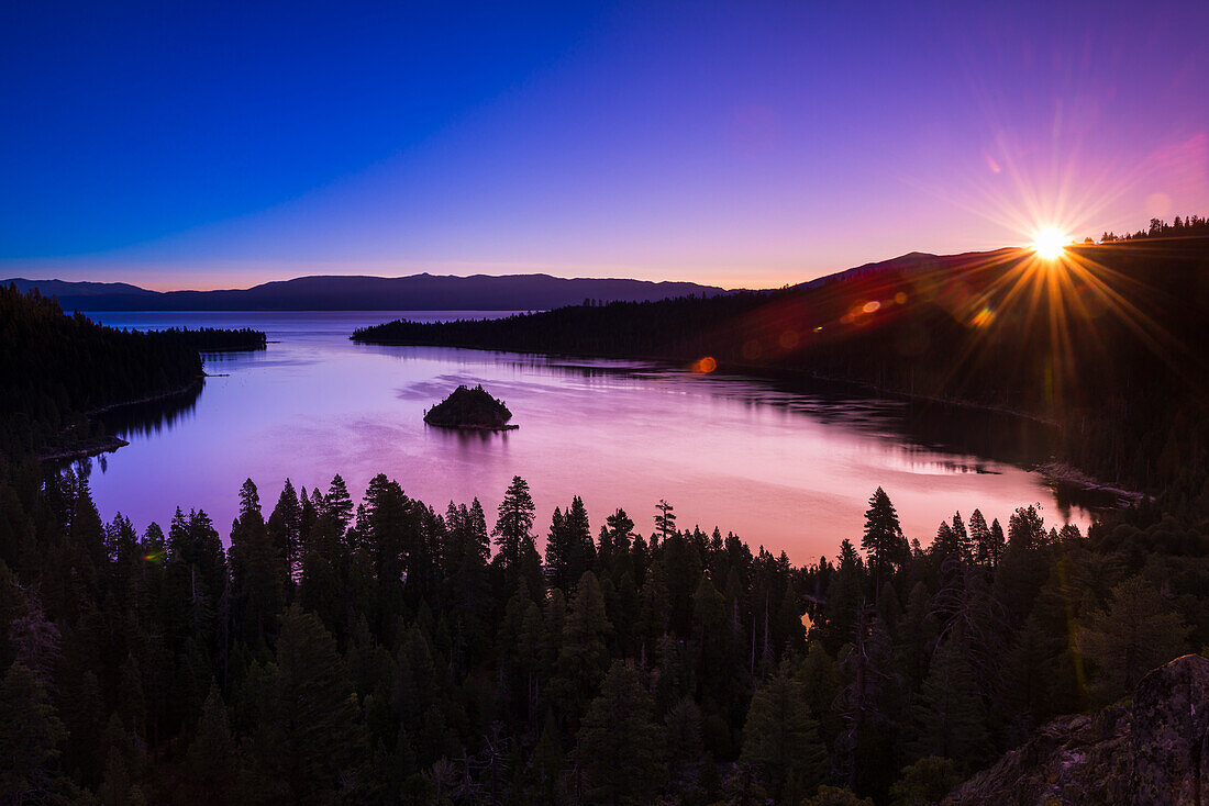 Dawn light over Emerald Bay on Lake Tahoe, Emerald Bay State Park, California, USA