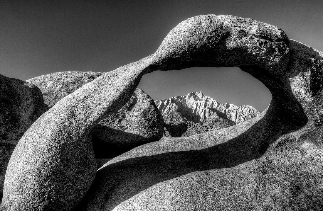 USA, California, Alabama Hills. Black and white of Mobius Arch at sunrise