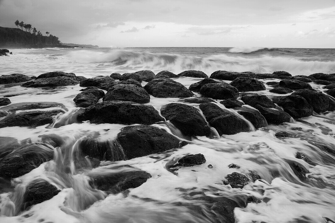 USA, Hawaii, Kauai. Black and white of rocky shoreline