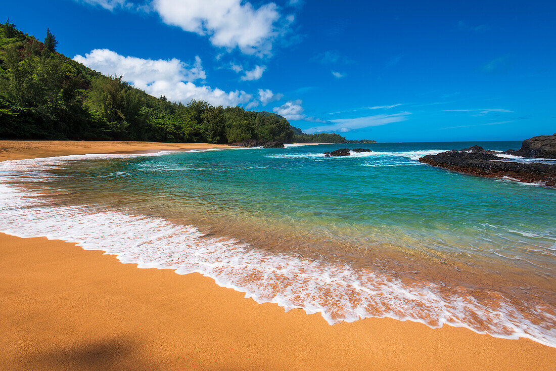 Sand and surf at Lumahai Beach, Island of Kauai, Hawaii, USA