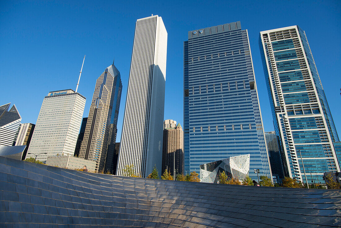 BP Bridge in Millennium Park in Chicago, early morning in autumn, with skyline