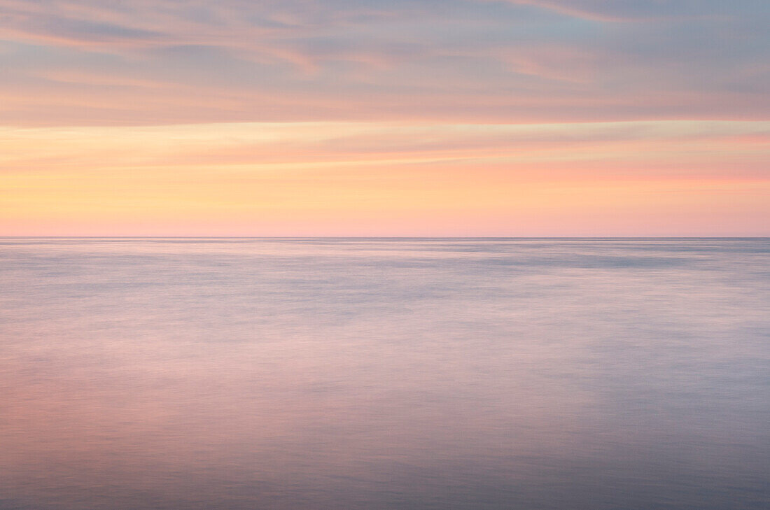 Sunset over Lake Superior seen from beach at Whitefish Point, Upper Peninsula, Michigan