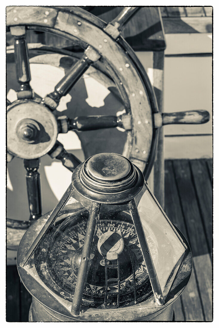 USA, Massachusetts, Cape Ann, Gloucester, America's Oldest Seaport, Gloucester Schooner Festival, schooner marine compass and ship's wheel