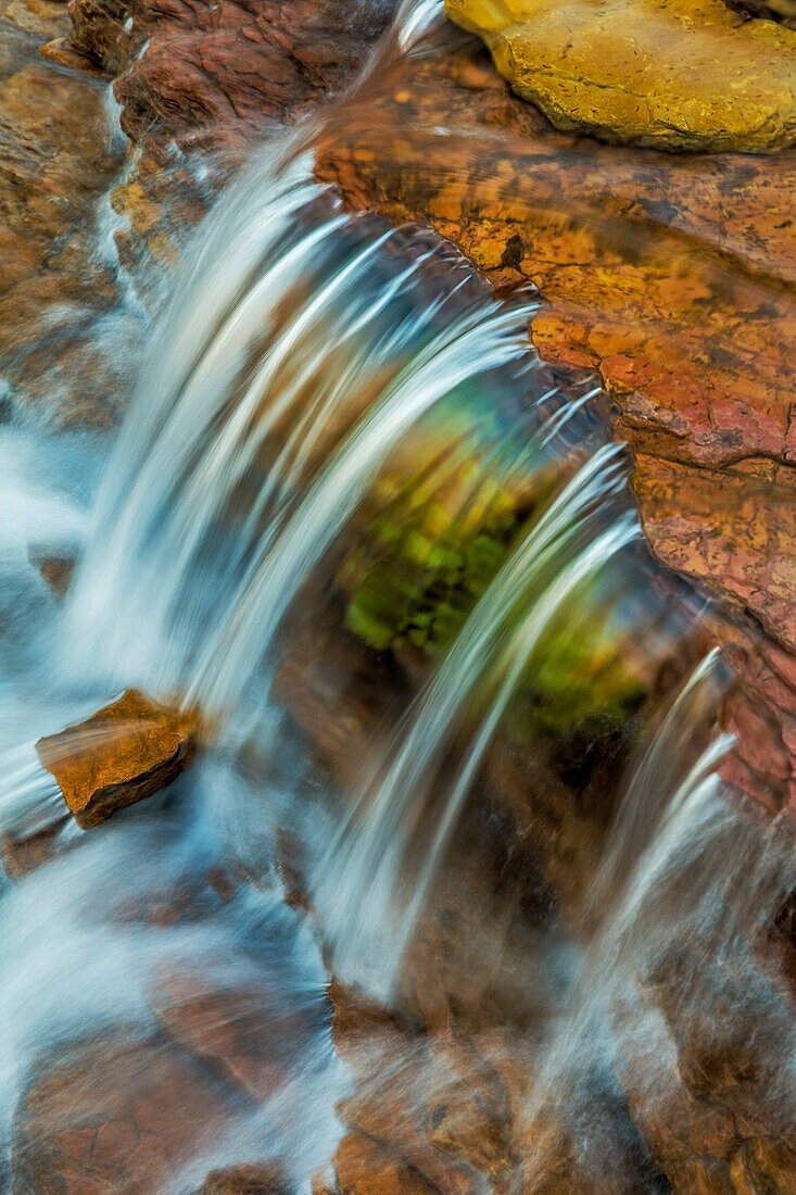 Colorful cascade on Oberlin Creek in Glacier National Park, Montana, USA (Large format sizes available)