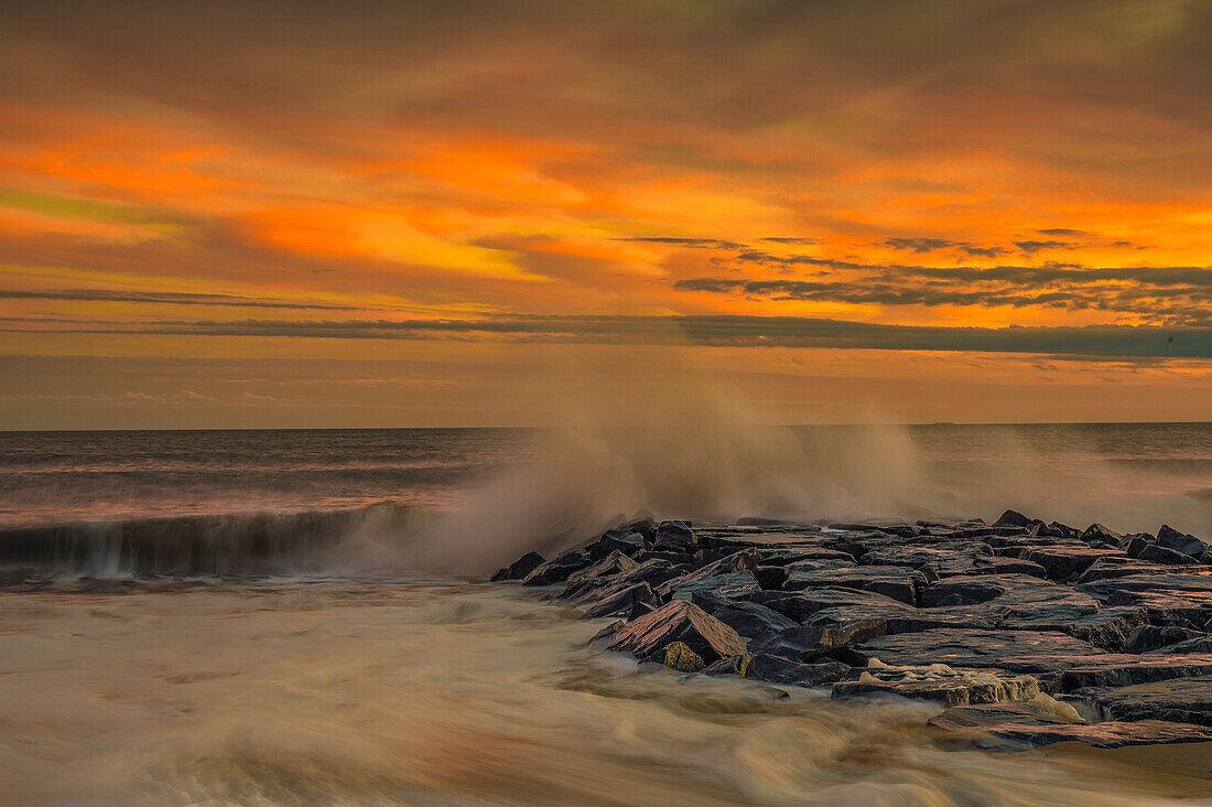 USA, New Jersey, Cape May National Seashore. Sunset on ocean shore