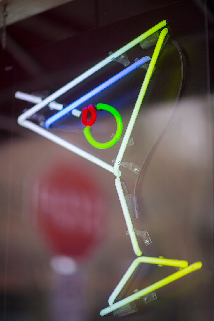 USA, Washington State, Seattle. A neon sign at a bar in the shape of a martini.