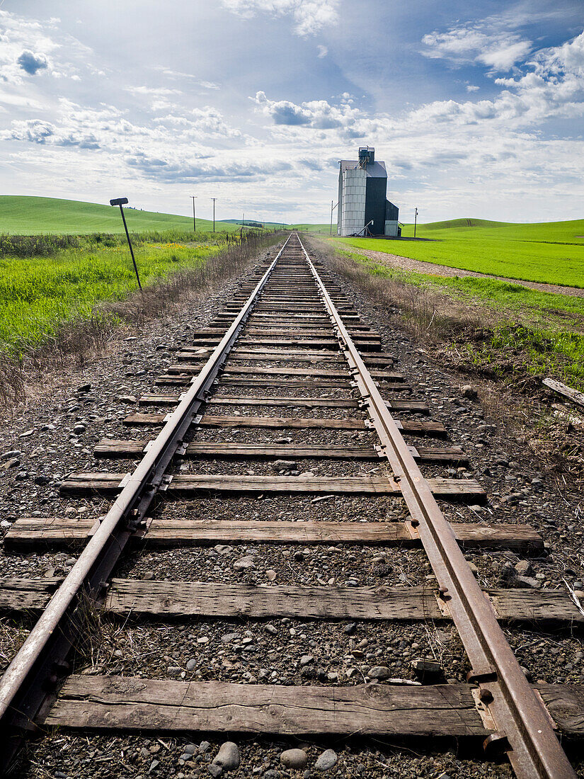 Train tracks and grain elevator in Eastern Washington.